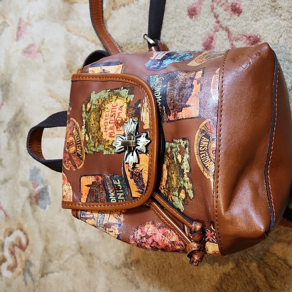 PATRICIA NASH Saracena Vintage Travel Sticker series flap drawstring backpack